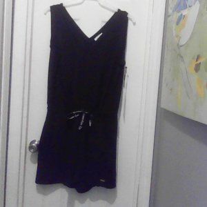 Calvin Klein Romper. Black, Large. Brand New with tags,  Never worn.